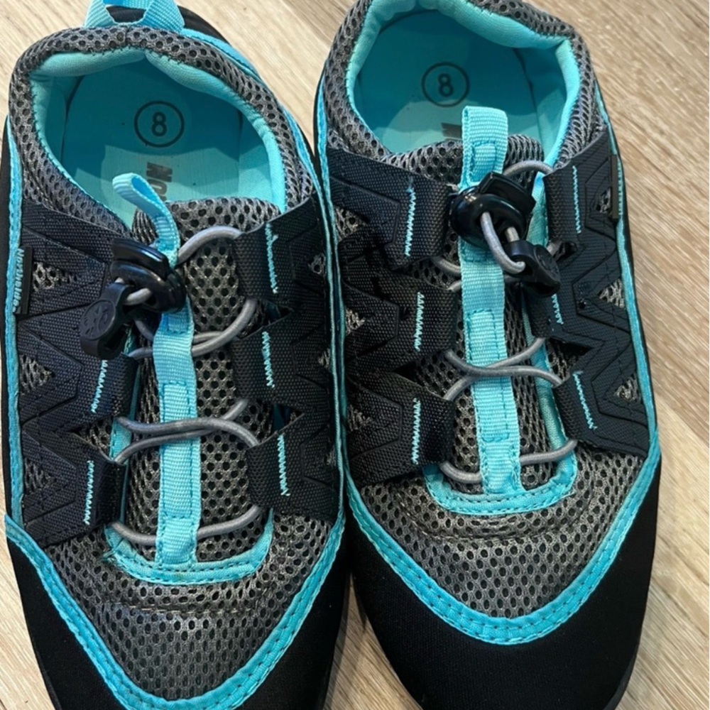 Northside Black and Teal Women’s activity shoes.
